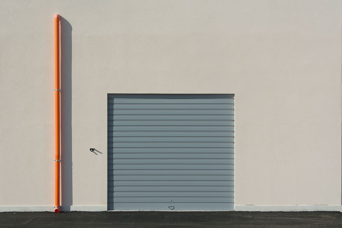 A neutral industrial workshop doorway